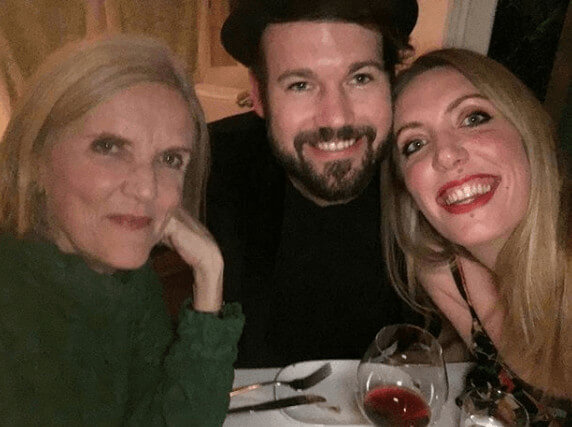 With Her Husband And Mother